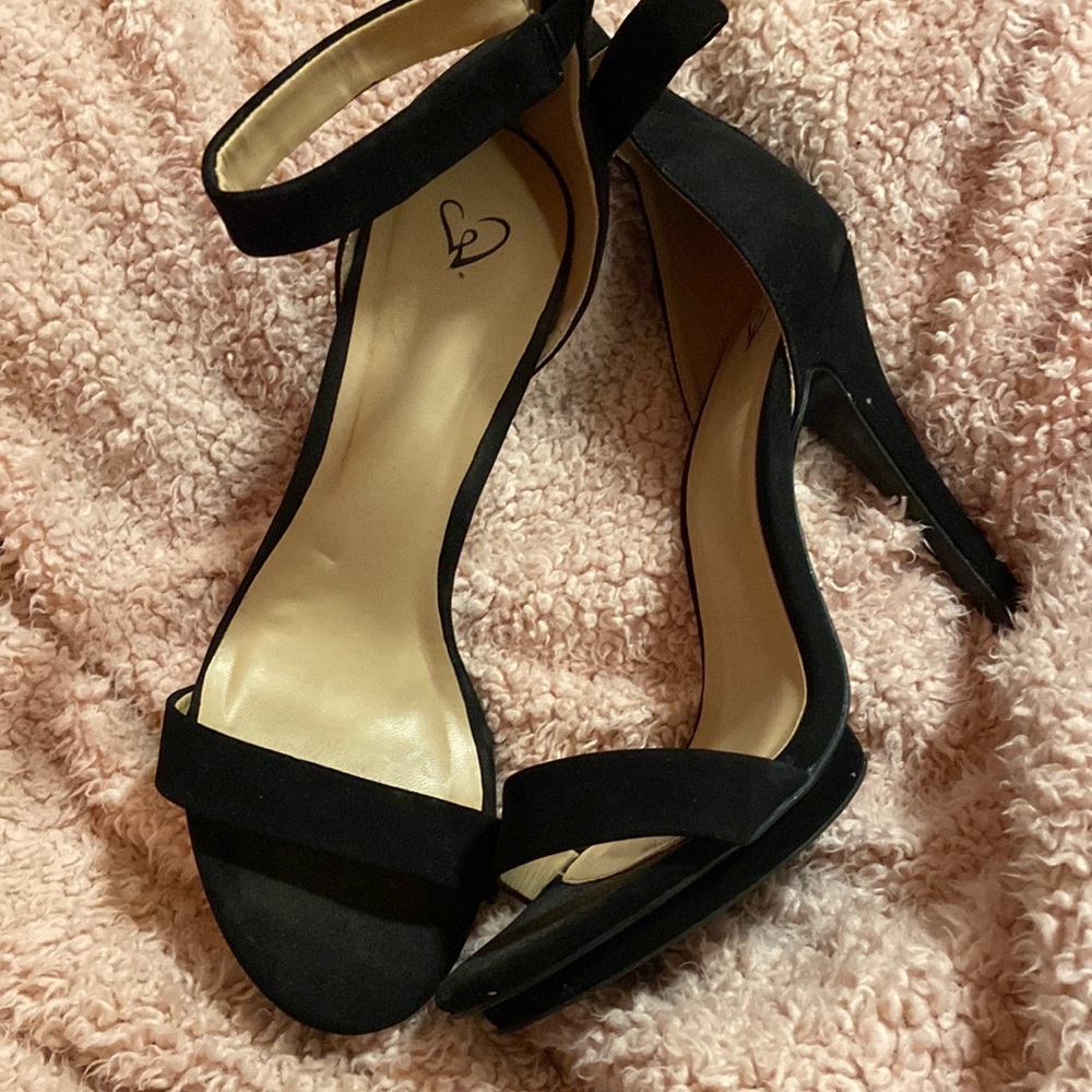 Black 4 inch heels, worn twice, strap at top and strap around toes